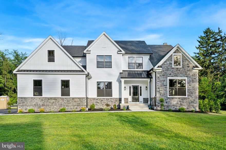Welcome to 688 Cathcart Road!!!   A stunning, custom built home featuring 4700 square feet of luxurious living space with a finished walkout lower level and 4 Bedrooms, 4 full baths and two 1/2 baths.  Situate on a beautiful 1.12 acre lot with a flat back yard in the heart of desirable Blue Bell and the highly sought after Wissahickon School District. The attention to detail and beautiful upgrades throughout make this home truly special and one of a kind.  You'll also notice the quality of the finishes are superior such as the magnificent, on-site finished, 6" wide white oak hardwood floors that flow throughout the entire first floor including an oak tread staircase with oak newel posts/hand railings and iron spindles that lead  upstairs into the lavish master suite. The grand entry foyer leads into the gracious living room featuring a shiplap ceiling that flows into the tucked away office featuring a double door entry, a decorative shiplap wall just perfect for working from home.  On the other side of the foyer is the elegant dining room featuring a coffered ceiling with custom paint perfect for hosting holiday dinners.  The impressive kitchen is every chef's dream featuring 48" Century custom cabinetry with upgraded crown molding, quartz countertops, an upgraded tile backsplash, upgraded stainless steel appliances including a double oven, gas burner cooktop, microwave drawer, an upgraded range hood and an oversized island with ample seating for 4 bar stools plus a built in pantry with wine fridge that flows into the breakfast room.  The adjacent family room makes entertaining easy featuring a floor to ceiling stone gas fireplace with hearth and mantle.  One of the best features of the home is the mudroom featuring a powder room with upgraded decorative tile, shiplap walls and everyone's favorite - cubbies with hooks that leads into the oversized 3 car garage with openers.  Plus there is a 2nd formal powder room off the foyer that completes the first floor.   Step upstairs into the luxurious master suite featuring a double door entry, 6" white oak hardwood floors, a tray ceiling with custom paint, a fabulous, oversized walk-in closet with custom-built organizers and a sumptuous master bath featuring a walk-in shower with custom shower door and upgraded shower heads, an upgraded heated tile floor, a freestanding slipper tub, quartz top double bowl vanity, custom cabinetry and upgraded fixtures. To complete the 2nd floor, you'll find an ensuite with a luxurious bath featuring an oversized shower and a walk-in closet, two additional bedrooms that share a jack n jill bathroom featuring a quartz top double bowl vanity, upgraded tile and a separate room with the shower and toilet. Plus a dream laundry room with upgraded tile floor completes the 2nd level.  And wait there's more!  The finished lower level features a slider and stairs leading out to the yard which is perfect for a 2nd office, a home gym or  extra living space perfect for an au pair or in-law suite plus there's a full bath and lots of storage.  Additional features of this magnificent home include 9 foot ceilings on every level including the finished lower level, extra wide baseboards, 2 powder rooms, Andersen black windows, Hardie plank and board and batten siding, 25-year charcoal black shingle roof, stone exterior fireplace, upgraded metal roofs on front and side porches, 2 zone HVAC system - all which highlight the quality of materials featured in this home and are much more sophisticated than your typical builder grade. The location is unrivaled and so convenient to the Center Square Shopping Center, the HomeGoods shopping center and the ever popular restaurants - Castello's Blue Bell Inn,  El Sarape, Panache and Radice.   A truly must see home!!!