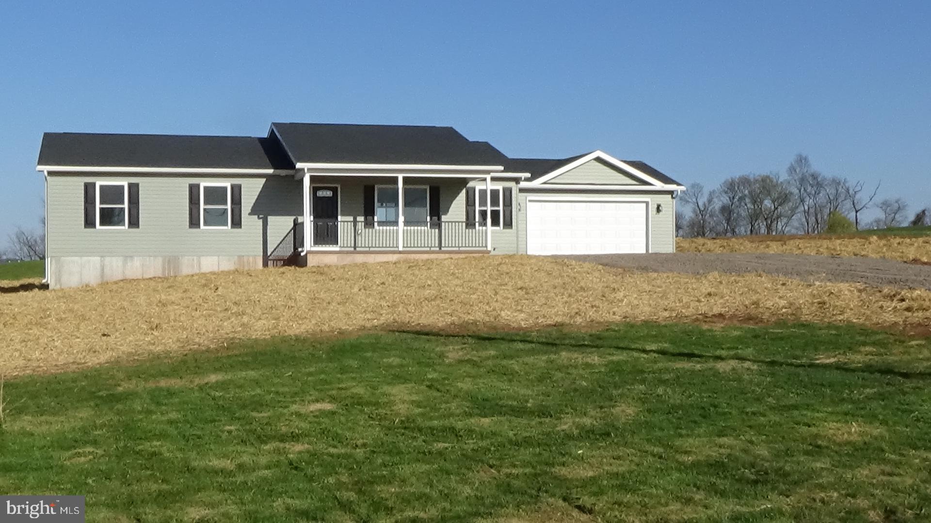 Brand new ranch home on 1 acre, One level living with 3 bedrooms and 2 bath, Custom kitchen with island and all new appliances. Large laundry includes a wash sink as well as new washer and dryer. Walkout basement is wide open could be finished for extra living space. 1 acre corner lot, just outside of town with a country setting.