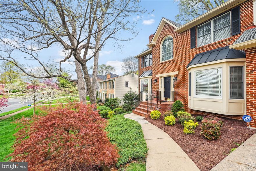 Ahead of its time, this Cumberland Homes  Colonial, with its high ceilings and expansive kitchen into family room, is simply a prelude to the exquisite interior with 6 bedrooms and 4.5 bathrooms including the highly-prized main level bedroom with private bath.
 
The grand 2 story foyer with marble flooring, chair railing and wainscoting welcomes you into a multitude of beautiful rooms, each one more stunning than the last. The marvelous open floor plan provides fabulous flow for entertaining beginning with the formal sunlit living room with bay window, hardwood flooring, crown molding and gorgeous brick fireplace. The formal dining room is equally impressive with chair railing, crown molding, wainscoting, hardwood floors and a second bay window. The butler’s pantry is perfectly situated between the dining room and the kitchen. Discreetly placed is the much desired powder room. For family and friends, the kitchen will always have a magnetic draw, and this one will not disappoint. With abundant natural light, this kitchen radiates a cheerful aura with its bright white and abundant cabinetry, center island breakfast bar with wine storage and pendant lighting, gas cooktop with hood, stainless steel appliances, hardwood flooring, recessed lighting , crown molding and large breakfast area overlooking the rear deck. Off the kitchen, everyone will find the great room with gorgeous stone fireplace, ceiling fan, skylights and access to the private rear deck an outstanding way to continue a wonderful day with warm companionship.
 
The upper level boasts 4 bedrooms and 2 baths including the exquisite primary bedroom with sitting room and en-suite bath. There’s also a wonderful office for personal business and work from home.
 
Evenings will joyously continue in the enormous travertine floored recreation room with wet bar and fireplace on the walkout lower level accessing the rear patio and level rear yard. Several distinct spaces are beautifully separated by decorated pillars - ideal for a media room, family room and gaming room. Another large bedroom and full bath provide all the overnight spaces needed. Storage space on this level is fabulous.
 
Ideally located on a quiet street in a sought-after neighborhood, this special property is also just minutes from the exciting shopping and dining at Tysons Corner, entertainment at Wolf Trap and Meadowlark Botanical Gardens and commuter routes like Chain Bridge Road, 66 and 495.