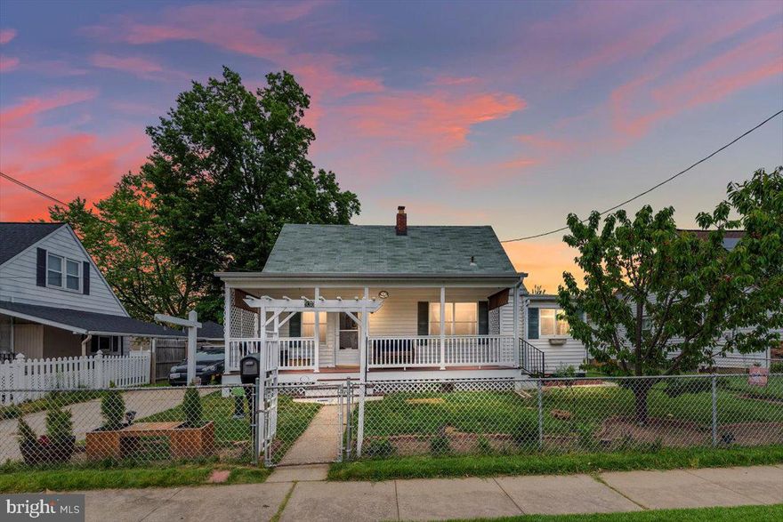 Welcome Home! This spacious three bedroom cape cod is tucked away in Marlyn Manor on a beautifully landscaped, fully fenced in lot with a large concrete driveway. Walk in the front door to original hardwood floors leading to the updated kitchen with plenty of counter space. Enjoy summer evenings on your oversized front porch or back patio. Layout is perfect for families large or small - the back living room can be converted to a fourth bedroom and there is a bathroom on each floor! This home also features top of the line appliances, a fully finished basement, and extra storage in the shed and utility room. Suburban living just minutes from local shopping, commuter highways, and downtown Baltimore. Won't last long.. schedule a showing today!