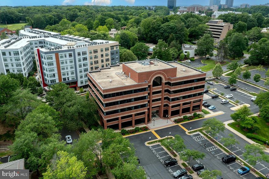 OWNER-OCCUPIER OPPORTUNITY | BELOW REPLACEMENT COST | METRO-ADJACENT

Secure your corporate headquarters in Northern Virginia's hottest growth corridor at 37% below original purchase price. This 12,535 SF Class A office condominium in Commerce Executive II offers an exceptional opportunity for defense contractors, government services firms, or professional practices seeking to own rather than lease in the Dulles Technology Corridor. Ideal for companies seeking to own their headquarters with flexibility to occupy the full space or lease a portion to offset carrying costs.

STRATEGIC LOCATION: 6-minute walk to Wiehle-Reston East Metro (Silver Line) with direct Dulles Toll Road frontage. Join industry leaders CACI, Booz Allen Hamilton, Leidos, and General Dynamics who have chosen the Reston/Herndon corridor for its unmatched access to federal clients, Dulles International Airport, and Northern Virginia's deep talent pool. Minutes to Reston Town Center, Google campus, and Reston Hospital.

TURNKEY & FLEXIBLE: Merged from four suites but easily divisible for multi-tenant investment strategy. Features five secure private entrances, three fully-equipped kitchenettes, multiple conference rooms, open collaborative workstations, and ten dedicated parking spaces with abundant visitor parking.

ZERO OPERATING HEADACHES: HOA covers all utilities, janitorial services, exterior maintenance, landscaping, and professional on-site management. 24/7 secure access and elevator service included.

VALUE PROPOSITION: Offered at $2,750,000 ($219/SF) - significantly below replacement cost and current Class A construction costs exceeding $350/SF. Control your occupancy costs, build equity, and eliminate rent escalation risk.

Located steps from Wiehle-Reston East Metro (Silver Line) with frontage on Sunrise Valley Drive and direct Dulles Toll Road access. Surrounded by major defense contractors and technology companies including Leidos, General Dynamics, and SAIC. Minutes to Reston Town Center, Google campus, and Reston Hospital.

Ideal for companies requiring 8,000-15,000 SF or investors seeking value-add opportunities in a stabilizing market. Contact listing agent for private tour, floor plans, and pro forma analysis.