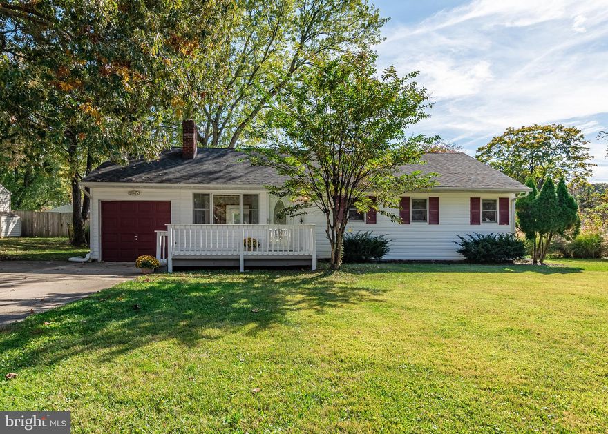 Congratulations, you've found it - a  move-in ready detached home in Severna Park , (way) under $400000!  Your opportunity to own a delightful home with a large level yard to love. Open the door to a living/dining combo - flex space with a fireplace and LVP flooring.  Walk through to the 4 season sunroom (not included in the sq ft on the tax record) and a great view of the yard .     A large kitchen  in the center of the home provides another view of the yard from your window over the sink.   
Part of the garage has been converted to a mudroom/laundry area leaving plenty of room for storage.     The entire home is freshly painted, with new carpet installed in all 3 bedrooms.  An updated hall bath, with natural light from a skylight  completes the space.  You can enjoy the yard from refreshed front and rear decks.  To make life easier:  whole house fan, pantry in kitchen, replacement windows, seller purchased home warranty.    Recent updates:  2023 -complete interior professionally  painted, carpet in all bedrooms, decks painted, toilet, attic exhaust fan,  2019- dishwasher, water heater, light fixtures, storm doors,  2018 - LVP flooring in LR,DR, sunroom and hall,  2017 - disposal.    What a lifestyle choice !  You will be 7 mins to Lake Waterford (fishing and recreation) and Beachwood (water access) parks, and minutes from the Magothy  RIver, yet close to commuter routes and amenities in Severna Park...
Please stop by for a visit - you may want to stay for a while!