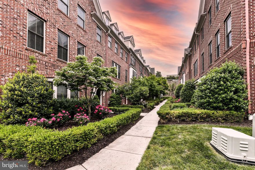 3BR, 3.5BA, 2car-garage 2100+sq ft home in the sought after Shirlington Crest neighborhood, a premier location with the arts & entertainment of Arlington*This stunning townhouse has an inviting roof-top deck to spend your spare time & entertaining your guests*Upon entry, this townhouse greets you with a sitting room/den that has recessed lighting & front-facing windows + full bathroom*Hardwood floors, recess lighting, neutral paint & upgraded moldings + an abundance of natural light throughout main level*Light & Bright living room with decorative-only fireplace surrounded by custom built-ins leads to formal dining room with chair rail & crown molding*True Gourmet kitchen with ample 42" white cabinetry, granite countertops with complimentary backsplash & stainless steel appliances including dual wall ovens, center island with 5-burner gas cooktop & expansive walk-in pantry*1st upper level features 3 bedrooms with ample closet space & 2 full updated tiled bathrooms + for your convenience, the laundry room is located on this floor*2nd upper level features open area + 3rd full bath & access to super cool rooftop deck! Conveniently located steps away from Shirlington Villages with shopping, boutiques, theatres, award-winning restaurants and more*Hop onto I-395, Crystal City aka soon-to-be National Landing, also convenient drive to downtown Washington DC, Reagan Airport & Pentagon City METRO Station*Less driving means more time enjoying everything the area has to offer at your fingertips*WO&D trail & Four Mile Run dog park steps away*Close to popular areas such as Old Town Alexandria, the Pentagon, Clarendon, Ballston & Rosslyn*Additional storage space in garage & terrace level*You do not want to miss this one!