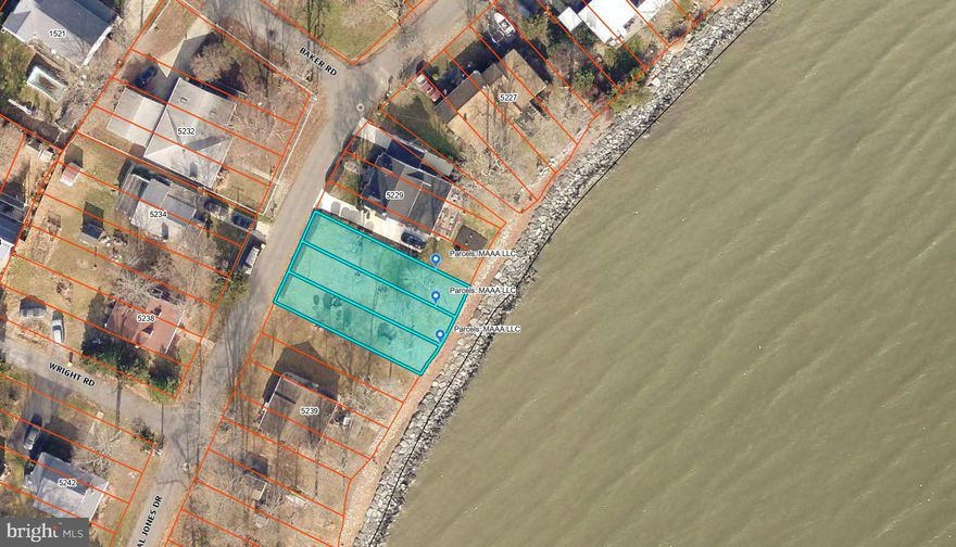 Priced below tax assessment. Chesapeake Bay Waterfront! Opportunities like this don't come around too often. This is the perfect lot to build your dream weekend getaway or year-around residence in the small, historic, gated community of Columbia Beach. This flat lot offers 60 feet of bulkheaded waterfront, sewer hookup and dazzling views of the Bay. Columbia Beach provides residents opportunities for boating, fishing, and other recreation. At the north end of the community is a boat launch, a short fishing pier, a long pier as well as a large playground, basketball court and several benches to enjoy the stunning views with the Bay Bridge in the distance. No flood insurance needed! Non riparian rights. Gate code required  to enter the community.