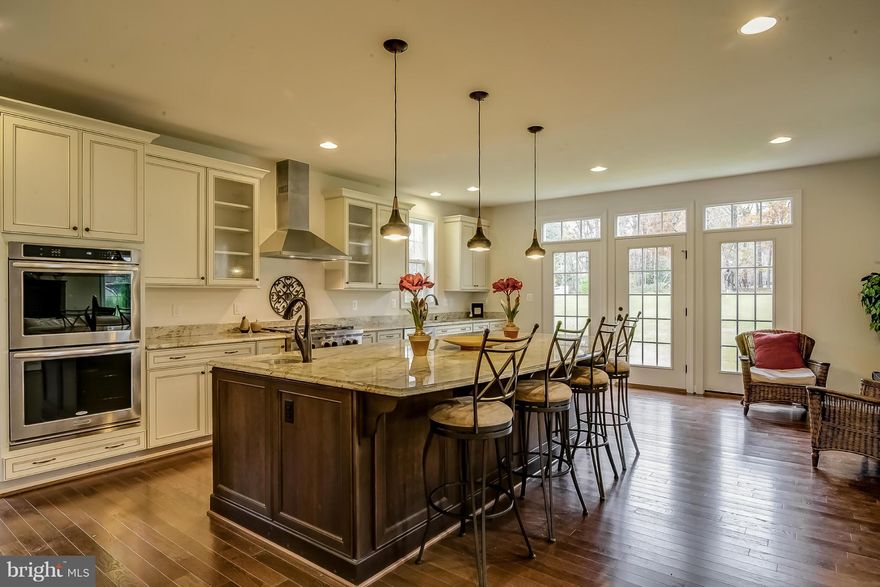 IMMEDIATE DELIVERY!Beautiful,brand new Douglas Homes Westchester Model.Never been lived in.Unbelieveable chefs kitchen with oversized granite island,xtra large fridge/freezer&pro style gas cooktop.5 bedrooms each with thier own private full bath.Oversized back yard backing to preservation/community open space.Fully fin basement with full bath,bedroom,wet bar roughin&walkout.Hardiplank.3car gar.