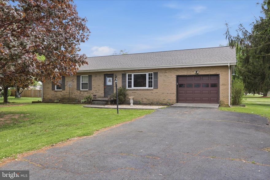 Well-maintained 3-bedroom with the possibility of a 4th bedroom, 2-bath rancher situated on a .67-acre lot in the Cherry Grove community. A new roof and gutters just installed and select interior spaces have been freshly painted. The home features a mix of hardwood, carpet, tile, and laminate flooring throughout. Newer windows and the fence is about two years old. So, plenty of room to make it yours with a few updates. 

Additional highlights include a one-car garage with attic storage above, a spacious rear deck ideal for outdoor enjoyment, and a shed providing extra storage. The existing playground equipment conveys with the property.

Located in a portion of Cherry Grove with no HOA, offering added flexibility and no monthly fees. State-maintained roads provide year-round accessibility, including snow removal.