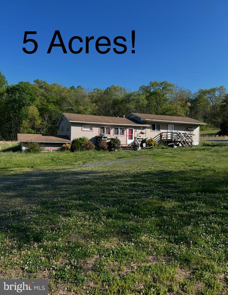Charming 3/4-Bedroom Home on 5 Flat Acres with a Stream

Discover this serene 3, possibly 4-bedroom/office, two full-bath home set on five beautifully flat acres—perfect for gardening, recreation, or small-scale farming —with a creek running alongside the property. This home offers peaceful views and a touch of nature right outside your door.  Ideal for gatherings, outdoor enthusiasts, or anyone seeking country living with ample space to grow. Large rec room with woodstove. Concrete patios on both sides of the home.  Only 5 minutes to Route 29. Washer and dryer hookups are available on both the basement and primary levels. New water heater. Being sold AS-IS. It needs TLC but is priced to sell below the tax assessment! Water  test, and Termite test have already been done. Ready for a contract!