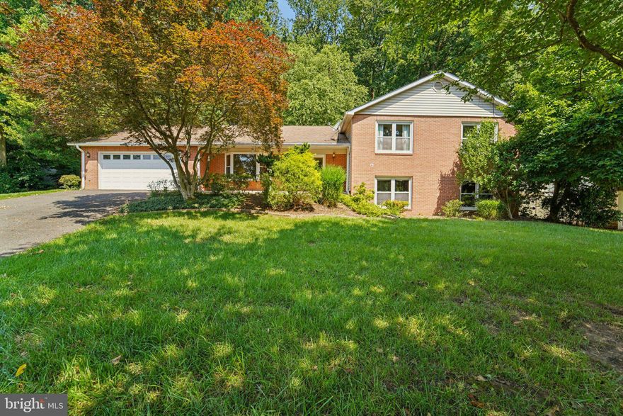 BACK ON MARKET! Tucked away on a quiet cul-de-sac in Bowie, this deceptively spacious 5-bedroom home offers over 3,100 sq ft of thoughtfully designed living space on a beautifully landscaped 0.77-acre lot. From the outside, it may seem modest—but step inside to discover a home full of comfort, function, and style.

The heart of the home is a gourmet kitchen with a large center island, ideal for both entertaining and everyday living. Upstairs, enjoy generously sized bedrooms, including an updated primary suite with a beautifully renovated bath.
The finished lower level adds incredible versatility, featuring a large den with a cozy fireplace and walkout access to the backyard. You'll also find an additional bedroom, dedicated office space, and a half bath—perfect for guests, remote work, or multigenerational living.
Out back, unwind in the hot tub or just relax in a cozy, semi-private yard surrounded by mature trees and landscaping—offering a peaceful retreat without the upkeep of a larger lot.
This home is a true hidden gem in one of Bowie’s most desirable neighborhoods—schedule your showing today!