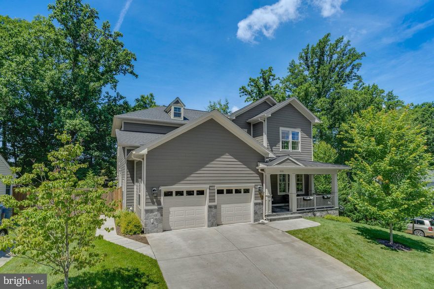 Beautiful Craftsman home custom built in 2018 and located in sought after Eudora. Quiet cul-de-sac location and sited on a .24 acre lot. Elegant interior with 5 bedrooms, 4.5 baths and 4,644 finished square feet over 3 levels. Open floor plan perfect for entertaining with a formal living room, dining rooms, chef’s kitchen, breakfast nook, and inviting family room with gas fireplace. Attention to detail is everywhere with upgraded finishes, high ceilings, plenty of natural light, and imported hardwood flooring in the main and upper level. Luxurious owner’s suite with wet bar, walk-in closet and spa bath. Three additional large bedrooms and two full baths, including one en suite, on the upper level. Finished walk-up basement complete with a recreation room, gym, movie room, wet bar and in-law/au pair suite. Outdoor living at its finest with a Trex deck, fenced yard, professional landscaping and welcoming front porch with sunrise views. Private yard with 15-20ft leyland cyprus on the front side of the house. Convenient location close to downtown Vienna shops, restaurants, parks and the W&OD Trail. Top rated Wolftrap/Kilmer/Madison pyramid.