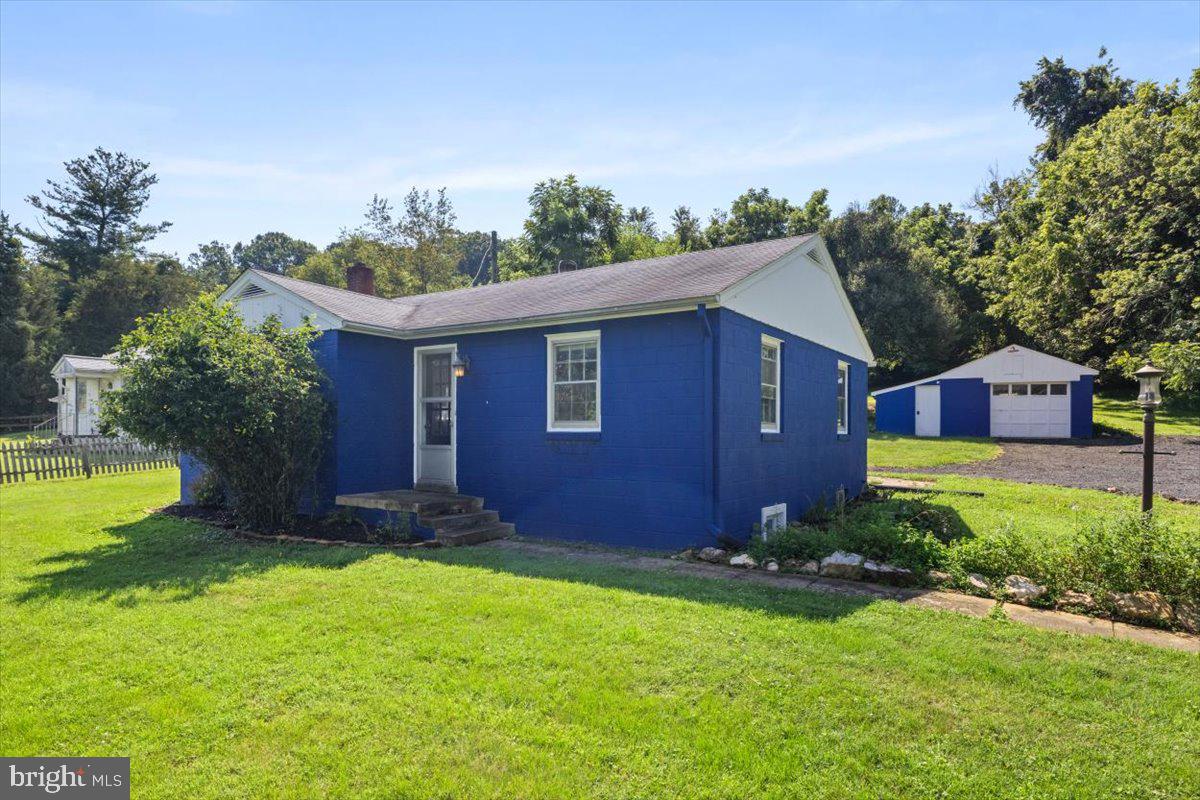 Nestled in a peaceful country setting, this inviting home offers the perfect blend of rural charm and everyday convenience. Surrounded by mature landscaping and located just off a paved road for easy year-round access, the property is only minutes away from a local winery and distillery, ideal for weekend outings or entertaining guests. Moreover, the home is just minutes from the MARC Train, offering easy commuting to the city and beyond.
Step inside to discover an open-concept main level highlighted by beautiful rustic hardwood floors and an abundance of natural light. The kitchen features a warm, open country feel with unique hammered copper countertops that add character and style. The sunroom/breakfast area is a standout space. Bathed in natural light, it’s the perfect spot to start your day, unwind with a book, or simply enjoy the changing seasons. Storage is no issue here, with plenty of closets throughout and an easily accessible attic that provides ample room for all your seasonal and extra items.
The partially finished basement expands the living space and includes a spacious bathroom complete with a soaking tub, separate walk-in shower, and dual sinks. A large flexible room downstairs can be used as an additional bedroom, recreation room, or home office.
This property includes a generously sized garage perfect for storage, hobbies, or working year-round. complete with a cozy woodstove to keep the space warm in all seasons. Whether you're a car enthusiast, craftsman, or just need extra space, this garage offers both functionality and comfort.
This home offers a rare opportunity to enjoy a laid-back, country lifestyle without sacrificing modern comforts.