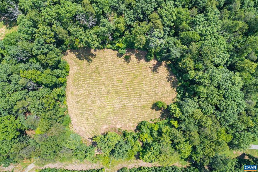 Rare offering of 2 flat and very private acres in Albemarle County! Cleared home site surrounded by gorgeous mature woods. Only 4 miles to Charlottesville - an easy drive to all amenities. No HOA. Soil test perked for a conventional drainfield for a 4 bedroom home. A prime offering ready for your plans!