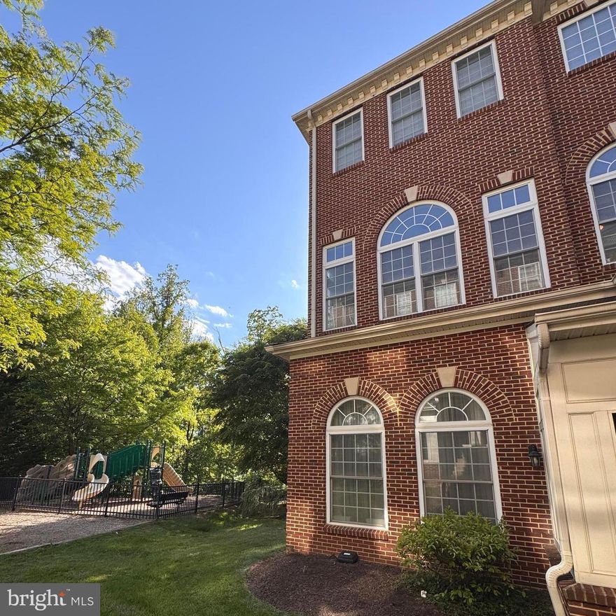 Welcome home to the perfect blend of comfort, space, and convenience in this stunning 3-bedroom, 3-bath corner-unit townhouse-style condo offering a beautifully appointed living space in the sought-after East Market at Fair Lakes community. Step inside to an inviting open floor plan with an abundance of natural light, featuring gleaming hardwood floors, soaring ceilings, and a warm gas fireplace that anchors the spacious living area. The gourmet kitchen is a chef's dream, featuring granite countertops, stainless steel appliances, rich cabinetry. Upstairs, retreat to the primary suite complete with walk-in closets and a luxurious en-suite bath. Additional bedrooms are bright and versatile.  A rear-loading garage provides convenient and secure parking.Step outside to your private balcony and enjoy the peaceful treeline views. The community offers resort-style amenities including a swimming pool, basketball courts, and scenic walking and biking paths, everything you need right at your doorstep. Ideally located just minutes from Fair Lakes Shopping Center, premier dining, Whole Foods, major commuter routes (I-66, Rt. 50, Fairfax County Pkwy) and a complimentary commuter shuttle to the Vienna Metro. This property is a must see.