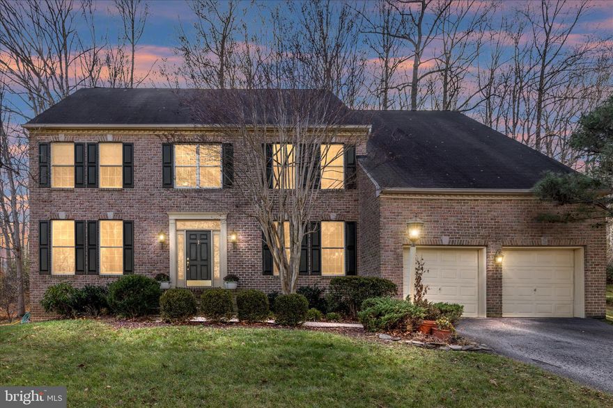 Welcome to this beautiful brick-front Koch-built home in Davidsonville’s sought-after Cambria community, featuring the convenience of sidewalks along with public water, public sewer, and natural gas. With 4,330 sq ft of finished living space, this home blends comfort, elegance, and everyday functionality.
The main level offers a dramatic two-story foyer, formal living and dining rooms, and an open family room with a wood-burning fireplace. The gourmet kitchen includes stainless-steel appliances, a center island with an updated gas cooktop, and a double wall oven. Fresh interior paint and just-installed upper-level carpet enhance the home’s move-in-ready appeal. A dedicated main-level office provides flexible space for work or study.
Upstairs features 4 spacious bedrooms, including an oversized primary suite with large walk-in closets and a spa-like bath with soaking tub, walk-in shower, and dual vanities. The finished lower level provides a large recreation space and multiple storage areas ready for customization.
Set on a private, wooded lot, this exceptional home offers both comfort and convenience. The community offers a tot lot and with easy access to Route 50, Route 97, and Downtown Annapolis.