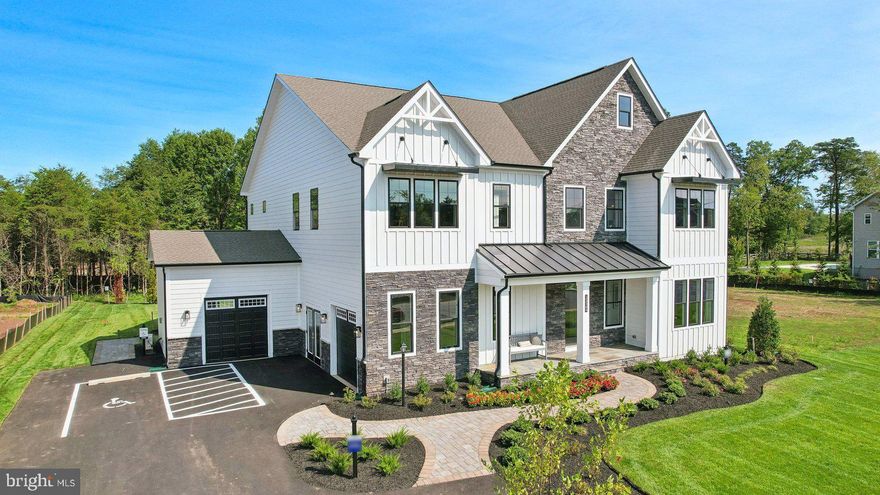 The community Model Home - Designed with an extensive grand 2-story foyer, this home plan warmly greets your guests. Complete with dining, foyer, great room, primary bedroom & primary bath tray ceilings, the formal dining and flex room lead you to a spacious beamed ceiling great room, kitchen and first floor bedroom with full bath. The owners entry features built in cabinets and a private entry to the main level bedroom with ensuite full bath. All bedrooms have their own private baths and walk in closets.  The expansive Primary suite has dual walk in closets, sitting area and primary grand bath including a free-standing tub and spa-like shower. This design offers a finished recreation room and the basement bedroom and full bath are complete for your convenience.
Up to $10,000 total closing cost is tied to the use of DHI Mortgage.
*Photos, 3D tours, and videos are representative of plan only and may vary as built.*