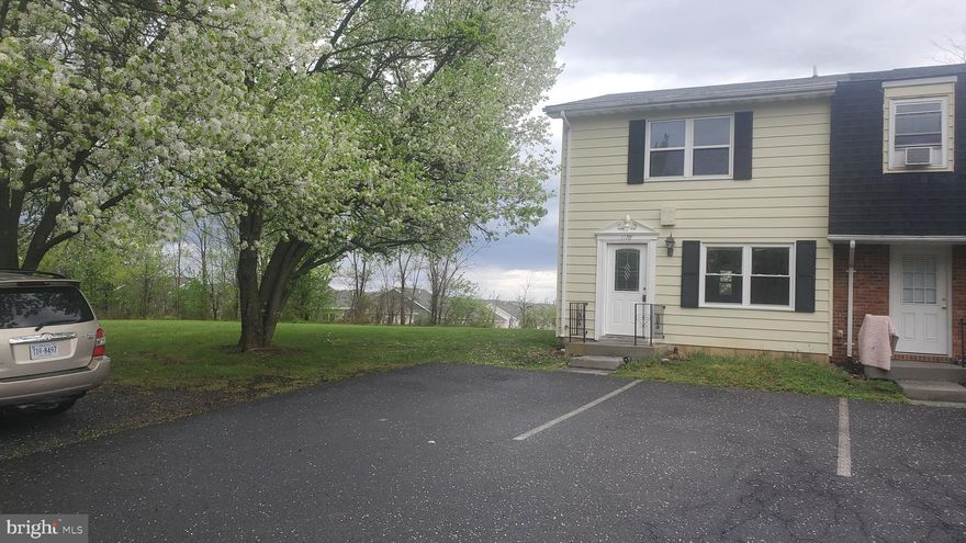 This townhouse has had several high quality upgrades. Cabinets are beautiful, interior doors are a nice upgrade, exterior doors ar a really nice upgrade, ceramic tile in the kitchen, new waterproof laminate going in, interior walls and ceilings fresh tan painted,  young heat pump, nice rear deck, fenced back yard, new roof going on, some pressure washing done for that spic and span condition.  No maintence should be expected here for  a long time.  There is a huge mowing maintained field next to this townhouse which allows 3 extra parking spaces to this townhouse's 2 already,  until the field is built on,  which hasn't happened in hundreds of years.  Seems to be a really nice quiet area down on this end.  Hurry to see the several huge Bradford Pear trees blossoms  next to driveway and house. Owner is a nice realtor.