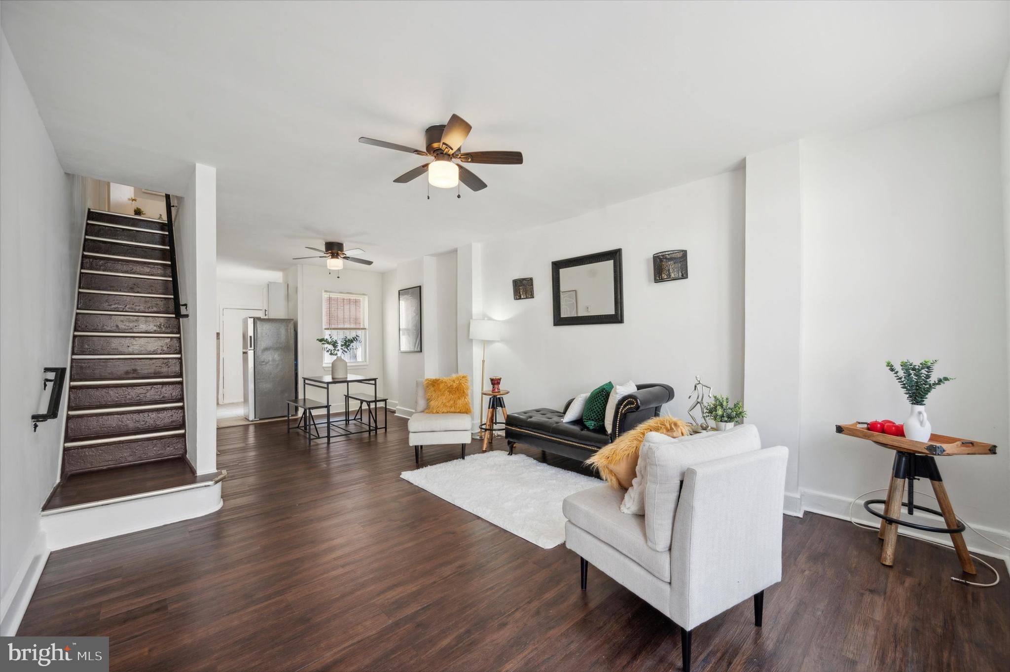 Welcome to 921 N 45th Street! This beautiful home was completely renovated from top to bottom. New kitchen, new bath, new flooring, new drywall, new plumbing. Also features a partially finished basement with a laundry room and half bath. Gas heat. Spacious bedrooms and bath, open floor plan on the first floor with plenty of natural light, and a backyard patio perfect for barbecuing or enjoying your evening drink. Excellent location with easy commute to University City, Drexel, UPenn, route 76, and Center City. Easy public transportation. All of this at a fantastic price! Make your appointment today!