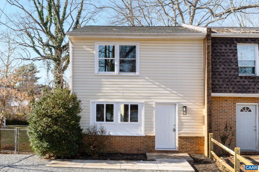 This lovely and affordable city townhome has just gone through a full and meticulous restoration and is truly move-in ready.  Featuring three bedrooms and 1.5 bathrooms, 607 Prospect Ave also offers a beautiful new and reconfigured kitchen with stainless appliances, solid surface counters, tile backsplash and updated lighting.  The half bath downstairs likewise is completely new as is the LVP flooring that runs throughout the main level.  New French doors open onto the rehabbed and freshly stained rear deck with overlooks the fully fenced back yard.  Upstairs features all new vinyl flooring, full bath with refinished tub, new vanity, toilet, lighting and more.  New interior paint throughout, new heat pump, new windows and a roof that is approximately 5 years old.  Out front is a new concrete walkway, refreshed driveway and ready-for-spring landscaping.  All this within minutes of Downtown, 5th Street Station and UVA, definitely turn key and not one to miss.,Wood Cabinets