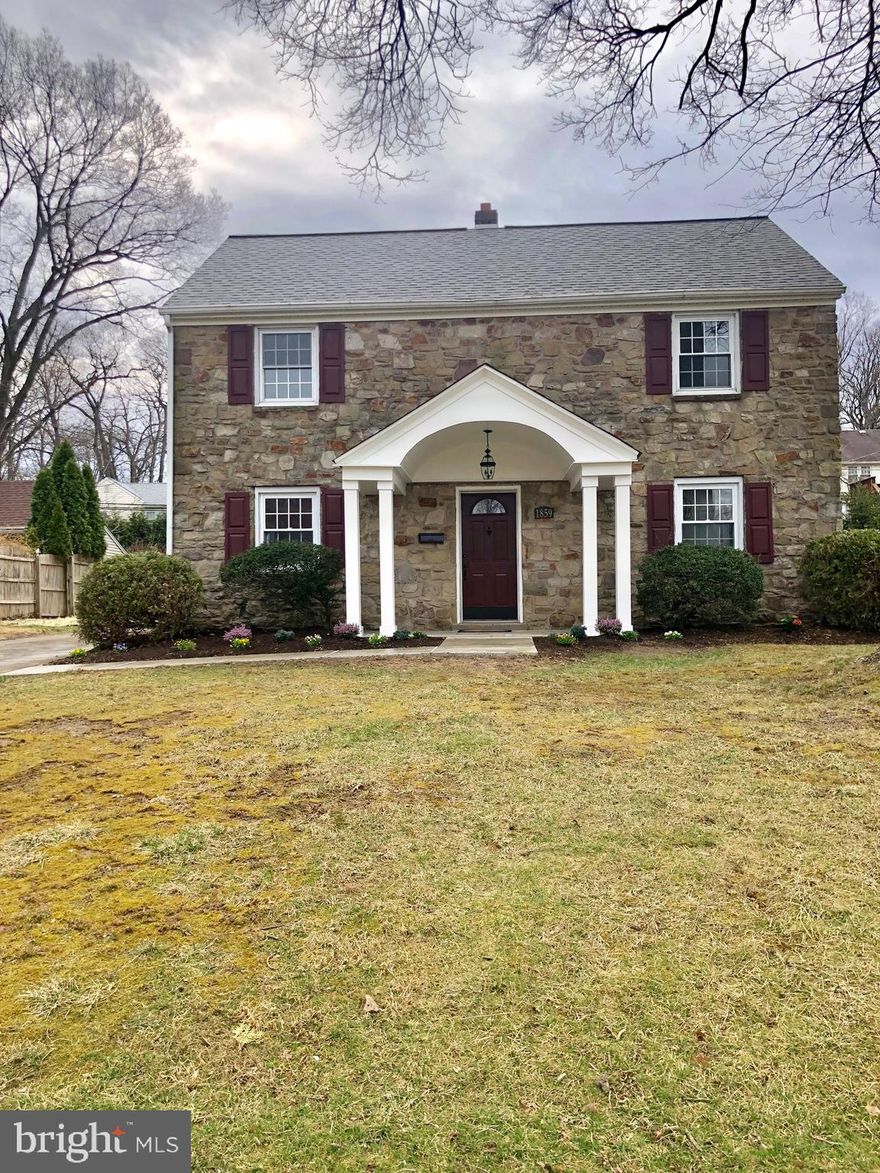 Completely renovated stone colonial home with detached garage in Overlook Hills. A stellar location, this home is across from a wonderful neighborhood park, and half a block to the elementary school. Enter this lovely house, freshly painted with new floors throughout. You will find a spacious living room with built-in's and a fireplace. Brand new open concept kitchen features white shaker cabinets, quartz counters, marble back splash, new gas range with hood and stainless steel  appliances. Sunlit family room with sliding barn doors open to a fully functional mud room / laundry area with brand new front loading washer & dryer. Second floor features 3 spacious bedrooms with ample closet space, a hall bath and linen closet. Master bedroom includes an en suite bathroom, featuring walk in shower with sliding glass doors and feature tile work. Master suite also includes walk in closet and plenty of room for a king sized bed. Home has brand NEW systems; Plumbing, Electrical, HVAC, On Demand Hot Water Heater and Roof. This gem of a home is waiting for you to move right in.