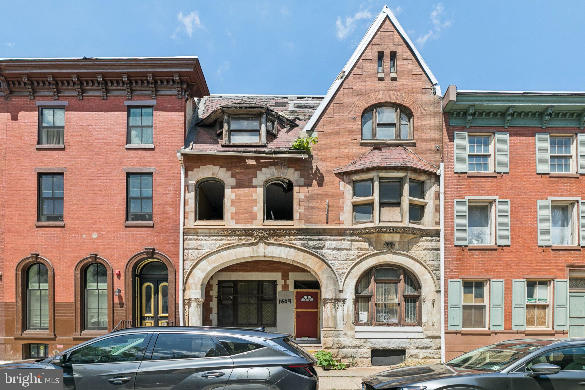 Historic Renovation Opportunity in the Heart of Fairmount! Zoned RM-4 (Residential Multifamily). Located in a federally designated Qualified Opportunity Zone (QOZ). Listed on the Philadelphia Register of Historic Places. Eligible for the City of Philadelphia’s 10-Year Tax Abatement (subject to compliance with applicable requirements).
1609 West Girard Ave is an historic, Victorian/Beaux‑Arts style, 3-story masonry building offering approximately 5,226 SF above grade on a 30’ x 150’ lot (approximately 4,500 SF total lot area) with two street frontages: Girard Ave (front) and West Flora Street (rear). Ideal for multifamily redevelopment (subject to city approval and historic restrictions).
Originally built in the late-19th century (city-recorded build-date, 1965, likely reflects a major renovation year rather than year built), the property has served multiple institutional and residential uses (ex. church, Sunday school, apartment building) over its life. The building’s historic designation recognizes its contribution to the architectural fabric of the Fairmount/Girard corridor, featuring classic Victorian masonry detailing such as the curved entry-archway and the grand spiral staircase.
Located just minutes from the Philadelphia Museum of Art, Barnes Foundation, Eastern State Penitentiary, The Franklin Institute, The Met, Girard College, St. Joseph's Prep School, North Broad Street, and Temple University, this property sits in a prime, high-demand corridor. Close proximity to multiple forms of public transit such as the Girard Ave Trolley Line and Broad Street Subway Line.
NOTE: Sale is subject to court approval. Property is being sold in its as-is condition. Buyer responsible for all due diligence. Don’t miss this rare chance to restore and transform a piece of Philadelphia history in one of the city’s most vibrant and rapidly-developing neighborhoods.