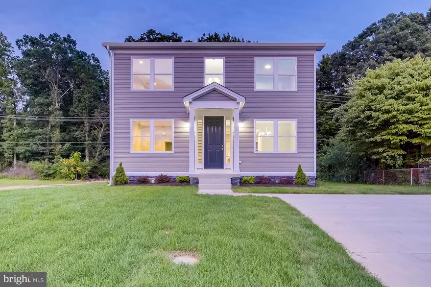 NEW CONSTRUCTION! 100% Completed with many upgrades including: Hardwood Floors throughout the first floor, 9 ft Ceilings, Recess Lighting, Granite Countertops, Granite Vanity tops, Stainless Steel Appliances,  Tile Backsplash, Dual Vanity Master Bathroom, Walk-in Closet, 200 Amp Service, 3 piece basement plumbing rough-in, Concrete Driveway, and Front Stoned Foundation. All this on a Level Lot that backs to Woods. Builders warranty included.