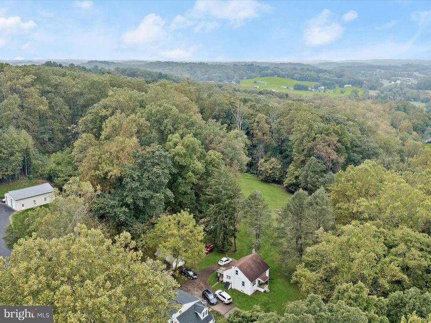 A unique opportunity for renovation or rebuilding ideal for those looking to create their dream home from the ground up in a great location.  Embrace the peaceful charm of country living with this 3-bedroom, 1-bath home, nestled on nearly one acre of partially wooded lot.  Offering a rare opportunity, this property includes the option to purchase the adjacent 5-acre wooded lot, providing endless potential for expansion or outdoor enjoyment.   Inside, the living room features carpeting over original hardwood floors, waiting to be uncovered offering a timeless look that extends into the formal dining room and main-level primary bedroom. The bright, functional kitchen opens to a covered rear patio, perfect for relaxing in the shade while overlooking the backyard, complete with a detached one-car garage and storage shed.   Upstairs, two additional bedrooms await, ready for you to transform them into cozy retreats. The unfinished basement provides ample storage space, laundry hookups, and room for DIY projects or future expansion. Located in Bel Air, this home offers the tranquility of country life while being just minutes from shopping, dining, entertainment, and easy access to I-95. This is your chance to own a home with incredible potential and room to grow.
Note:  Select interior photos have been virtually staged.