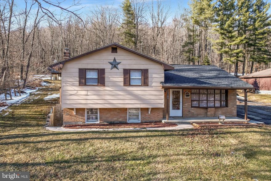 Tucked away on 1.37 acres, this property offers the kind of space, privacy, and peaceful setting that’s getting harder to find while still being just minutes from the Frostburg train depot and the conveniences of town.

With over 1,600 square feet of living space, the home features a spacious and flexible layout designed for everyday comfort. Natural light fills the main living areas, creating a warm and inviting atmosphere that immediately feels like home. Whether you’re relaxing inside or enjoying the open outdoor space, this property offers a lifestyle that blends comfort with room to breathe.

Recent improvements, including a NEW roof on both the home and garage, provide added peace of mind and long-term value. The detached garage offers additional storage or workspace, while the expansive lot opens the door to endless possibilities such as, gardening, entertaining, or simply enjoying your own private retreat.

The current layout includes one full bathroom, with space and potential for a future second bath, giving the next owner an opportunity to customize and build equity over time.

Whether you’re looking for a primary residence, a weekend escape, or a property with long-term potential, this home offers a rare combination of space, setting, and value.

Seller is open to assisting with buyer closing costs or offering concessions with an acceptable offer.