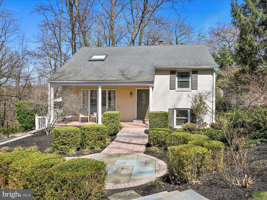 Welcome to 311 Woodland Avenue, a beautifully maintained 4-bedroom, 2.5-bath home perfectly situated on a quiet cul-de-sac just outside of Media Borough. This property offers the unique advantage of walkability to vibrant downtown Media and the train station, while also providing the privacy and space of a single-family home on a lush 1/4 acre landscaped lot. Just minutes from an array of shops, restaurants, and community events, and with easy access to Center City via the nearby train, this location truly offers the best of both worlds. Plus, the recently renovated Weldon Street Park—with new playground equipment—is just around the corner, adding even more appeal to this convenient yet tucked-away setting.The home is set back from the street, featuring a long private driveway bordered by a tasteful retaining wall, providing ample off-street parking. A brick herringbone walkway leads to a circular slate detail in the front yard and a covered front patio—an ideal spot to relax and take in the surroundings. Inside, the main living room features a large bay window, neutral paint, hardwood floors, recessed lighting, and a coat closet. Just a few steps down, you'll find an updated kitchen and dining area complete with crown molding, tile flooring, and stainless steel appliances including a Kenmore Elite 5-burner stove, LG refrigerator, microwave, and dishwasher. Granite countertops, a glass tile backsplash, undermount sink with backyard views, ample cabinetry, and a pantry closet make this space as functional as it is attractive. A nearby powder room and laundry area, equipped with LG front-loading washer and dryer and overhead cabinetry, add convenience. Beyond the kitchen is a bonus family room with updated vinyl plank flooring, storage closet, and direct access to the outdoor living space. The "informal" side entrance to the home makes it a great space for a mud room area, with a closet right by the door and a corner for coat hooks and shoes.  The upper levels of the home include four nicely sized bedrooms. The primary bedroom features hardwood flooring and a ceiling fan, while the renovated hall bath offers travertine tile throughout, a glass-enclosed shower with rainfall head and bench, a niche with accent tile, and a raised bowl sink with contemporary vanity and storage. There is a linen closet in this bathroom for convenient storage for towels and toiletries. Two additional bedrooms (one with dual closets) boasting hardwood flooring and neutral paint colors complete this level. The top level features a private fourth bedroom or flex space, complete with skylight, built-in cabinetry, large 7x7 walk-in closet, full bathroom with white vanity and tub/shower combination, and additional attic storage; perfect for a guest suite, home office, or workout area. Designed with entertaining in mind, the exterior includes a covered wraparound deck with a built-in jacuzzi and bar seating, as well as a separate multi-level deck with a pergola "nook". Your family and guests will never be without a place to sit with the plethora of outdoor spaces, both covered and uncovered!  A well-equipped shed with electricity, windows, and a glass storm door provides both additional storage and practical functionality, including a second refrigerator. Slate walkways guide you through the landscaped yard, which also includes open green space for recreation. Located in the highly regarded Rose Tree Media School District, 311 Woodland Avenue offers a tranquil residential setting with unparalleled proximity to downtown Media, the train station, and major commuter routes. This home represents a unique opportunity to enjoy the convenience of in-town living without compromising space or privacy.