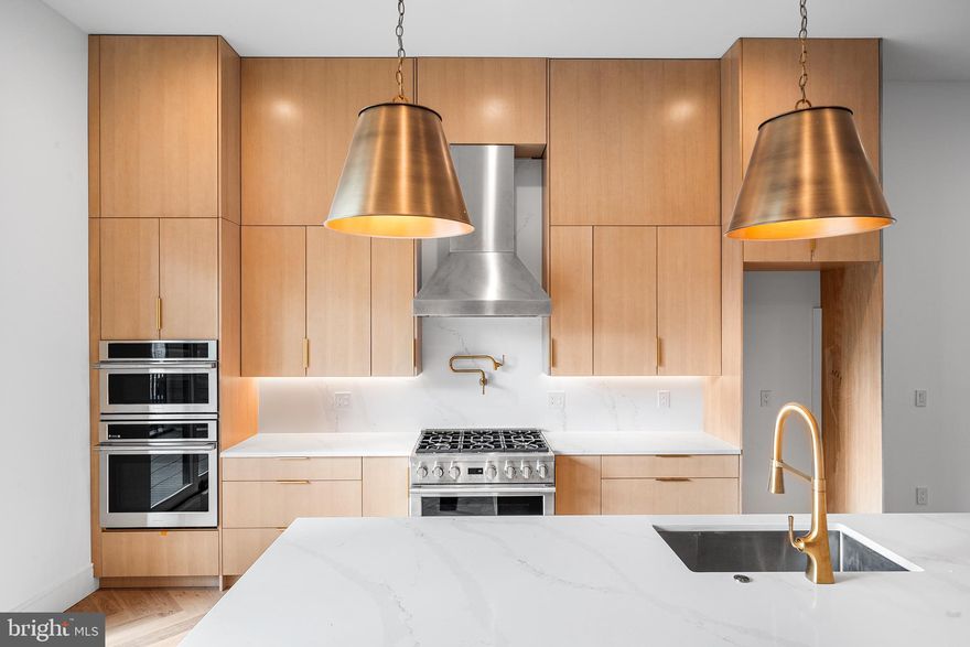 Welcome to the development of Oxford Commons, 1236, 1238 and 1240 E. Oxford Street. Introducing three extraordinary new construction homes, located on a quaint street, right in the heart of Fishtown. Rare ** FULL 10 YEAR TAX ABATEMENT ** is offered with these homes. Featuring breath-taking finishes, 2 Car Garage Parking and multiple outdoor spaces. Location. Location. Location. Savor the wealth of restaurants, bars, cafes, lounges, shops, gyms and the entertainment of Frankford Avenue. Take a quick walk over to the waterfront for parks and entertainment. Quick walk to enjoy even more restaurants and entertainment in Northern Liberties and Old Kensington. For transportation: In close proximity to Highway 95, Ben Franklin Bridge, Betsy Ross Bridge, Philadelphia International Airport and the Market-Frankford Blue Line (to Old City, Center City, 30th Street Station, University City, West Philly and Northeast Philly). A private driveway leads you into your generous two car garage. Easily park two cars side by side, with 220 volt line for your Electric Vehicle charger and space. As you enter inside, the first floor boasts 10 foot ceilings. A mudroom awaits with washer and dryer and full storage. Down the hall is a spacious bedroom and a jack n jill full bathroom. Downstairs is a fully finished basement with a bedroom, full bathroom, and a media room/office/ playroom/storage/for your imagination. Second floor greets you towering 12 foot ceilings and marvelous herringbone hardwood floors. The sizeable custom, gourmet kitchen is furnished with walnut or white oak flat panel modern cabinetry, extending up to the ceiling, luxury Monogram appliances, stone countertops, large island, with plenty of seating. The abundance of natural light permeating through the sliding patio doors, allowing you grill outdoors with ease; enjoy your morning coffee, etc. Vast dining and living space allow for entertaining with ease. The living room with oversized windows and gas fireplace is spectacular. The custom steel stringer, oak tread staircase leads you up to the third Floor. The 11 foot ceilings guide you to the bedroom in the rear, great for a home office, gym, nursery, etc. Modern hallway bathroom is adjacent to the bedroom. Yet another laundry room, conveniently located near your luxurious primary suite. Entering into your grand suite, you'll be pleased with 2 walk-in closets, a grand bedroom drenched in sunlight, and a stylish bathroom. The bathroom is furnished with 9 foot double vanity, private toilet closet and an immense walk-in shower with high-end tile selections, dual shower heads, dual rain head and wands for a true spa-like experience. Escape to the vast roof deck, unlike many you have seen in the city of Philadelphia, with unobstructed views of the center city skyline. Buyers are responsible for verifying taxes and square footage. The square footage per plans including the basement is 4,352. Please reach out for the spec package and further details.