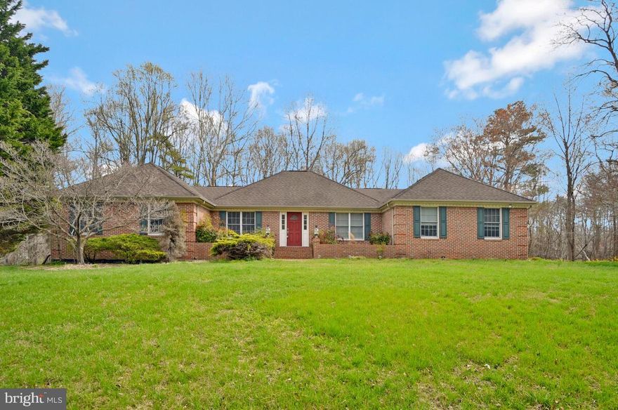 This wide‑open brick rambler sits on a fabulous private homesite and is ready for immediate possession! Recent updates include brand‑new carpet, refreshed appliances, updated countertops, and fresh paint throughout. The light‑filled, open floorplan offers plenty of room to spread out—making this a warm, welcoming place to call home. The main level features a spacious owner’s suite complete with a walk‑in closet and a private bath offering a soaking tub, separate shower, and double sinks. All additional bedrooms are generously sized as well. The open living room is a standout with its cathedral ceiling, cozy gas fireplace, and abundant natural light. Additional interior highlights include hardwood flooring, crown molding, and chair railing for an added touch of charm and character. Step outside to the oversized back deck—an ideal spot for summer gatherings, grilling, or simply enjoying the peaceful surroundings.
Swanson Creek Landing offers an easy commute to Washington D.C., Joint Andrews, and PAX River, and is just a short drive to town for all your shopping and dining needs. Outdoor enthusiasts will love being close to the Patuxent River, complete with a community boat ramp for weekend adventures.