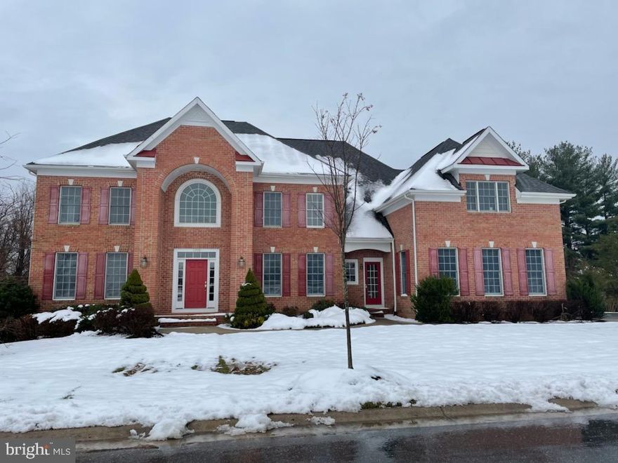 River Hill High School due to redistricting.
Masterpiece located in sought after south-west Columbia on a fabulous 0.45-acre lot, surrounded by open space and wooded area with resort-like outdoor. Beautiful neighborhood and close to all major roads and conveniences. This 3 SIDES brick colonial gem features over 5225 above grade square feet with 5 bedrooms and 3.5 baths, the house was built with many custom upgrades, 9-foot ceilings on all floors, phenomenal two-story foyer with a lot of natural light and chandelier with Aladdin Light Lift device, two story family room with a stone fireplace graced with floor to ceiling sunbathed windows. Extensive crown molding and chair railing throughout the first floor. Hardwood floor throughout the main level. Formal dining room with tray ceiling and centerpiece chandelier. Large size library with a closet that can be bedroom #5. Expanded sunroom enjoys morning sunlight, kitchen has granite countertop throughout, good size center island, range-hood with exhaust going outside. Main floor laundry in mudroom with laundry chute from upstairs. Dual stairs feature wood railing to the second-floor balcony over-looking two-story family room. The owner’s suite features a tray ceiling in both the sitting area and bed area and a fireplace in the sitting area, two access doors in two walk-in closets lead to big extra storage surrounding the owner's bathroom. The unfinished walkout basement has rough-in ready for more potential. Composite deck with access from rear door and sunroom. Three cars side entry garage.