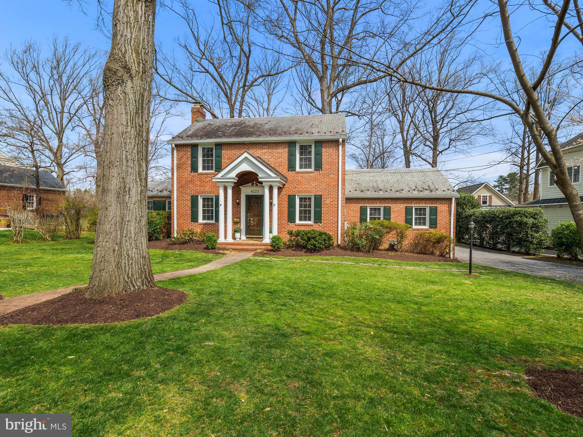 Welcome to 4223 Everett Street, a stately, expanded, and renovated Chevy Chase View beauty on a gorgeous .46-acre lot with oversized four car detached garage! Rarely do homes like this come on the market. The quality of construction, exquisite craftsmanship, gracious room sizes and thoughtful details will impress you from the moment you enter. Charming curb appeal and a covered front entry welcomes you to this special property. When you walk into the wide front to back hall, your eye will be drawn to the stunning molding. The main level offers a fabulous floor plan with all the features buyers are looking for today including a home office/library, gourmet kitchen with island open to the family room and main level bedroom and full bath. Highlights of the first floor include a spacious hall with coat closet, large formal living room with elegant gas fireplace, grand formal dining room, light-filled home office with vaulted ceiling and wall of custom bookcases, beautifully designed chef’s kitchen with large dining area/ breakfast room with wall of windows and French doors to side and rear covered porches, walk in pantry, fabulous step down family room adjacent to the kitchen with brick wood burning fireplace with custom mantel and French door to covered porch, side hall with large second large coat closet , and convenient first floor bedroom with walk in closet and full bath. A wide staircase with soaring window at the landing takes you to the second level which features a gorgeous primary suite with vaulted ceiling, dressing room/ walk in closet and spa bath with steam shower, three additional bedrooms, laundry room, hall linen closet and newly renovated hall bath with jetted tub. There are pull-down stairs to floored attic. The lower level with walk out French doors to side yard from stair landing has great living space with large step down second family room with high ceiling, custom office alcove, large bedroom, full bath, walk in cedar closet, utility room, and large storage room. But wait there’s more! Are you a car collector or need a workshop or potential accessory apartment or more entertaining/ home office space? The oversized detached four car tandem garage with a partially finished upper level with soaring vaulted ceiling has unlimited potential. The large, flat backyard is magnificent with amazing space for relaxing, family games and entertaining. There is great space for game of touch football and plenty of room for a pool! Imagine the memories you can in this beautiful home and property. Newer dual zone HVAC, newer 75-gallon hot water heater, well maintained slate roof and architectural shingle roof on addition and garage replaced three years ago. Interior of home just painted, move right in and start your next chapter in your dream home. Location, location. Location! All this space and yard so close in. Just a mile to the beltway and minutes to the heart of Kensington and its charming shops, restaurants, parks, weekly farmer’s market. Close to NIH, Grosvenor Metro, the MARC train, downtown Bethesda, Pike and Rose entertaining and shopping, and the upcoming Chevy Chase Lake & more. Welcome home!