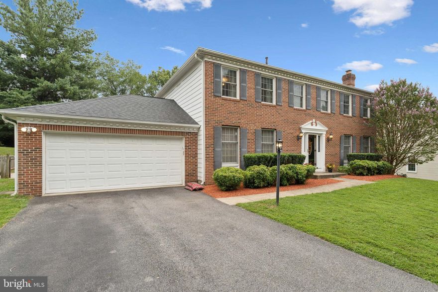 Beautifully maintained 5-bedroom, 3.5-bath single-family home, situated on a spacious lot. Featuring a long driveway, two-car garage, and thoughtfully landscaped backyard, this property offers both privacy and curb appeal.  Inside, you'll find gorgeous hardwood floors, two fireplaces, and custom built-in display cases perfect for showcasing art or collectibles. The main level includes a spacious living area and a screened-in back sun porch, ideal for year-round enjoyment. The finished basement features a full in-law suite, perfect for guests or multigenerational living. The owner’s suite includes a private sitting area, providing a peaceful retreat. Enjoy plenty of natural light throughout, and a flexible living space that adapts to your needs.