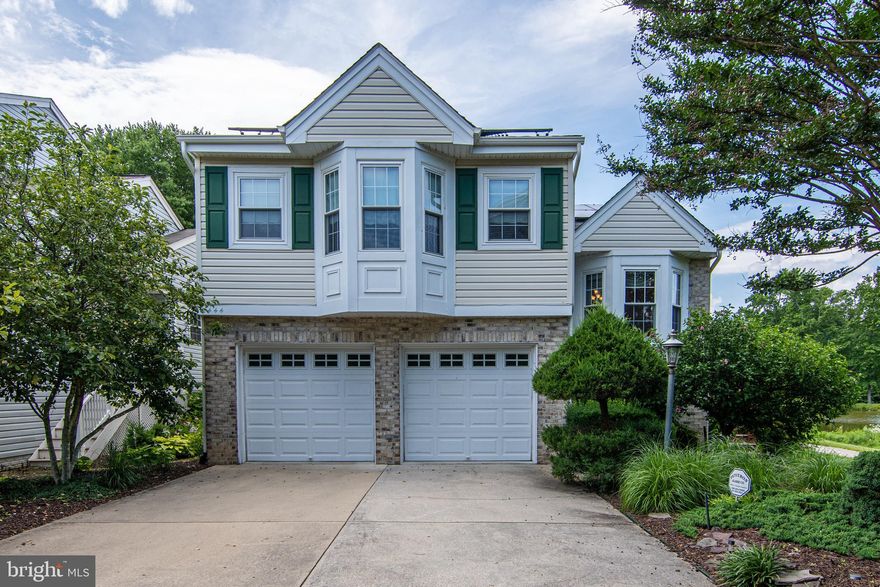 Golfer's Retreat!! Welcome home! This beauty is situated on a premium lot with BREATHTAKING views of pond and golf course. Home boasts 5 bedrooms, 3.5 baths, fully finished basement with 2nd fireplace, cooled wine closet, 2 bedrooms, and full bath, great for an in-law suite! Master bedroom has 2 closets, 1 of which is walk-in, and massive en suite with granite counters, custom tile, jetted tub and large shower. Top level features new carpet, 2 bedrooms overlooking the golf course and a full bath.  Massive gourmet kitchen with custom cabinets, center island with oversized gas cooktop, granite counters, stainless steel appliances, perfect for some one who loves to cook and entertain! Beautiful Brazilian hardwood floors throughout open concept kitchen/living/dining area which features a fireplace and walks out to recently re-stained deck overlooking the pond and golf course. The Walden community offers a swimming pool, a golf course and much more! The home is located in the Crofton High School district, shopping and major highways. Don't miss out, call me for a showing today!!