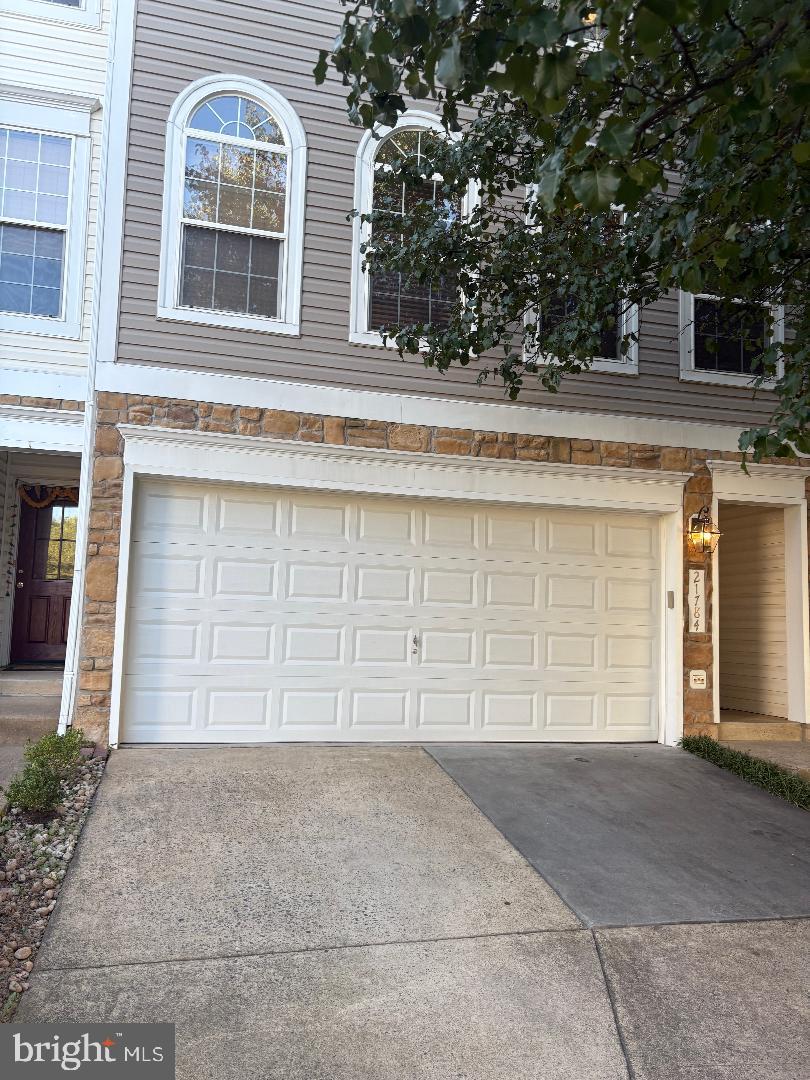 Well maintained 2 car garage 3 bedroom, 3.5 baths, spacious townhouse in great location near Silver Line Metro. Main level with gleaming hardwood floors, gourmet kitchen, stainless steel appliances, granite counter tops, center island, ceiling fans, recessed lights on entire main level, nice size Trex deck off the kitchen, good size 3 bedrooms, bedroom level laundry room with new washer/dryer, new carpet and many more features. Back yard has a fence and patio. New AC 2025, replaced water heater in 2025 and roof in 2018.