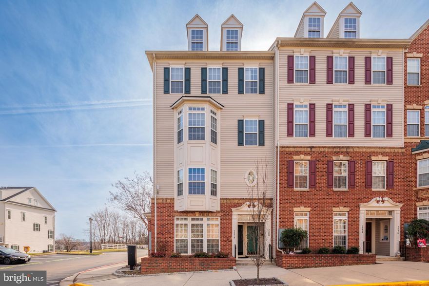 Beautiful 2-level, one-car garage townhome in Elkridge Crossing! High ceilings, crown moldings, and huge windows on this end of row townhome with a lot of natural light. Beautiful hardwood floors throughout the entire main level. The large living area flows right into the kitchen/dining space, which is has granite countertops, a 2-tiered island with pendant lights, and a built-in pantry. Beautiful stainless steel appliances in the kitchen including a huge fridge and a double oven. This main level is completed with a half bath and access to the rear entry one-car garage. On the upper level, you will find a spacious primary bedroom with two walk-in closets, lots of natural light, and a large ensuite bathroom. Adding to the home’s storage on this level, you will find two other linen closets in the hallway along with a large walk-in laundry room. Two additional nice size bedrooms and a second full bathroom round out this floor. Minutes from BWI and I-95!