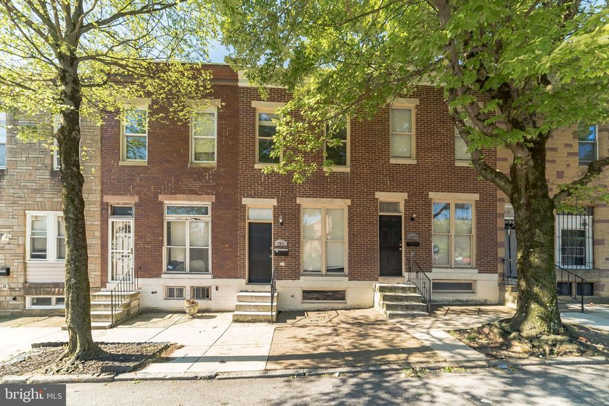 Beautifully updated 2 bedroom 1.5 bath Brick front town home. Walk into a light and bright open main floor with wood floors and recessed lighting. There is plenty of room for a dining area  which easily flows into the kitchen. The kitchen features cherry cabinets, granite counter tops, and stainless steel appliances including a gas oven. A door leads you to the easy to maintain back yard. Upstairs are two spacious bedrooms with plush carpeting, cooling ceiling fans and closets. A large hall bath and laundry complete the level. The unfinished basement is perfect for additional storage. Easy access to public transportation and downtown Baltimore. You do not want to miss this one!