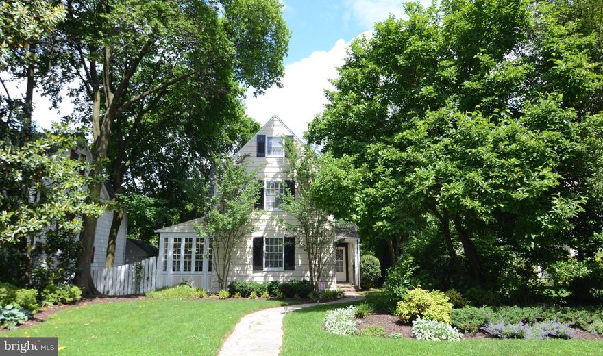 Updated classic cedar Cottage on landscaped lot! Wood floors thruout (except BR4) - all recently refin! LR w/stone FP/French doors to sunroom. Large DR. Enlarged kit w/tons of storage, cabinets, light. Upgraded appliances .Bring a king-sized bed to the MBR w/windows on 3 sides! Updated baths. 2 zone AC. Gravel patio/nice yard.2 car garage. 3blks to The Lakes. Walk to Belvedere Sq summer concerts!