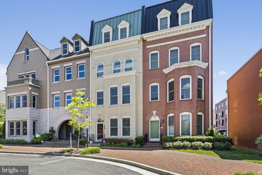 Welcome to 619 E Custis Avenue, a stunning 4-level townhome located in the heart of Potomac Yard. Exceptional renovations and upgrades have been made throughout this property.  Interior features such as 9 ft ceilings, wood floors, crown moulding, recess lighting and custom shutters exude luxury throughout. The entry level welcomes you with a stylish gathering area with a beverage bar, bedroom and renovated bath as well as access to the 2-car garage. The main level has an open concept and is flooded with natural light. In addition to the living and dining area, the highlight of this level is the renovated gourmet kitchen with quartz countertops, subway wave tile backsplash, stainless-steel appliances. Enjoy outdoor living at its best on the expanded terrace with privacy fencing. This area has direct access from the kitchen and is rarely available in the community. Retreat to the upper levels where the primary bedroom awaits with plantation shutters, custom built-ins, and an ensuite bath with dual vanities and a glass-enclosed shower. Also on this level is the third bedroom with renovated en suite bath. The uppermost level - with its large bonus room, full bath and rooftop patio - could be used as a fourth bedroom. Additional highlights include a laundry closet with LG appliances, closet systems in the upper level bedrooms, ADT security system, Ring Doorbell and more. With a Walk Score of 81, enjoy the convenience of nearby amenities including Amazon HQ2,  Potomac Yard Park and Shopping Center as well as Old Town & Del Ray with their unique boutiques, delicious restaurants, and cozy cafes. 

A short distance to the now open Potomac Yard/VT metro station (Blue,Yellow lines) and less than 10 minute drive to Reagan National Airport.