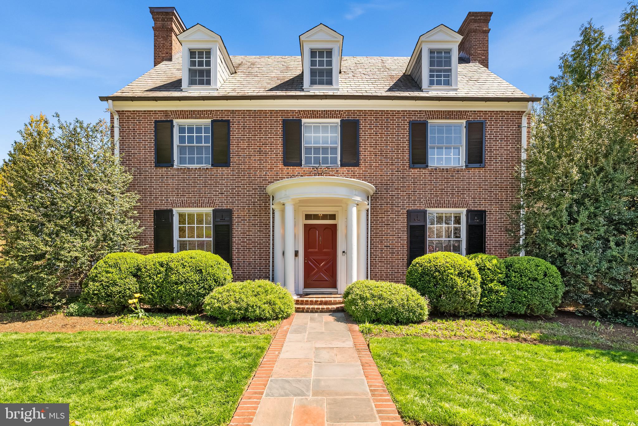 Open House Cancelled - Welcome to this impeccably maintained and masterfully renovated Georgian Colonial, privately nestled on Guilford’s hidden gem, cul-de-sac, offering exceptional privacy and a quiet, secluded atmosphere. Thoughtfully reimagined by renowned architect Austin Childs of the Monkton Design Build Group, this residence blends timeless architecture with sophisticated modern upgrades.
Step beneath the charming covered portico and through the classic vestibule into an impressive three-story foyer. To your left, the formal dining room connects seamlessly to a beautifully enclosed side porch—now transformed into a stylish butler’s pantry, complete with custom cabinetry, a wet bar, and dishwasher.
The gracious living room is anchored by a wood-burning fireplace and opens to a light-filled sunroom, ideal for morning coffee or evening relaxation. The chef’s kitchen is a showstopper, featuring Rojahn custom cabinetry, granite countertops, double wall ovens, a warming drawer, wine fridge, and a breakfast bar.
At the heart of the home is a stunning 2011 addition: the sunny breakfast area with built-in banquette flows into a spacious family room adorned with rich custom built-ins, surround sound, radiant heated stone floors, a wet bar, and a dramatic custom cupola that floods the space with natural light. French doors lead to a professionally landscaped, fenced backyard oasis—complete with a bluestone patio and cozy fire pit crafted by Natural Concerns.
Upstairs, the expanded primary suite features a custom-designed dressing area with built-in cabinetry and shelving. Two additional bedrooms share a stylish hall bath on the second level. The front bedroom features custom cabinets and shelving units, perfectly designed to be utilized as a convenient home office. Two more spacious bedrooms, sizeable cedar closet, and another full bath await on the third floor.
A detached garage, accessed via the rear alley, provides added storage and convenience. The lower level includes a laundry room, abundant storage, and a high-efficiency furnace installed in 2023.
This extraordinary home offers the perfect blend of historic charm and modern luxury—a rare find in the heart of Guilford. Professional Showings Beginning Wednesday, April 23rd - Photos to Come