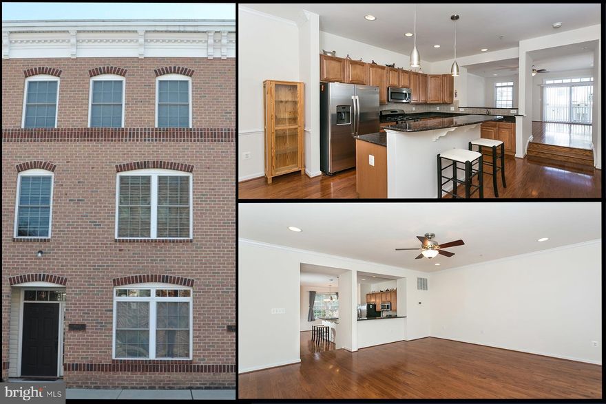 WELL MAINTAINED CANTON GARAGE TOWNHOME WITH 4 CAR PARKING - this beautiful townhome on quiet tree lined street just off Patterson Park features a two car garage and a two car parking pad, open main level floor plan with hardwood floors throughout, crown molding, eat-in island kitchen with granite countertops and tile backsplash, convenient half bath, separate dining room and deck off of the living room.  Upper level features two bedrooms suites, hallway laundry room, luxurious owner's bath with double bowl vanity and separate tub/shower with massive walkable rubber membrane roof top with incredible views!