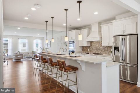 Photo of 7134 Proclamation Place, FREDERICK, MD 21703 (MLS # MDFR2079640)