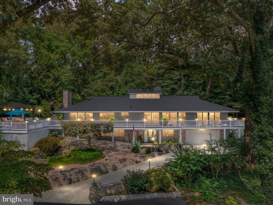 Exquisite Water View Oasis on the Shores of Tranquil Fairwinds on the Severn! Sellers reviewing offers Mon 6PM. 
Nestled along the pristine shores of Severn River in Severna Park, this remarkable water-view home offers the epitome of luxury living. With its breathtaking panoramic views, meticulously designed architecture, and an array of upscale amenities, this property is a sanctuary of tranquility and opulence. As you approach the estate, the community amenities welcome you. The property spans over 0.7 acres of woods and hardscaping featuring towering trees, exotic flora, and access to community amenities such as the white sandy beach steps away that gently kisses the clear waters of Severn River. The outdoor space is an entertainer's dream, featuring a sprawling deck with views of the Severn River, a mature KOI pond, and a blue slate patio. Relax in the covered pergola while sipping your favorite beverage and watching the mesmerizing sunset over the river. Your next home also includes access to the community deep-water dock with slips available, a pavilion, and a pool, and is perfect for avid boaters and water enthusiasts. 
Once inside, you are greeted by a large open foyer with a custom staircase and a cascading chandelier. The open-concept design seamlessly blends the living spaces, showcasing smooth chestnut hardwood floors, custom millwork, and floor-to-ceiling windows that frame the awe-inspiring water views. 
The gourmet chef's kitchen is a masterpiece, featuring top-of-the-line Kitchen Aid & Monogram appliances, an expensive quartz center island, and custom cabinetry. Flowing into the warm family room or dining room, where you can savor gourmet meals while gazing out at the river. The spacious living room and dining rooms boast a fireplace, cathedral ceiling, and walls of windows with views. 
Wake up in your primary suite, which is a true retreat, complete with access to the deck overlooking the river, a sitting area, and a spa-like en-suite bathroom with a soaking tub, a walk-in shower, and dual vanities.  Total of 4 bedrooms, 3.5 baths, and 2 home offices - checking all your play and work requirements.
This estate is designed for those who appreciate the finer things in life. Enjoy movie nights, or unwind out in your pergola. A recreation/game room with a billiards table with cozy spaces for relaxation and entertainment.
Conveniently located just minutes from BWI Airport, Annapolis, Baltimore, and DC. National Blue Ribbon schools, convenient access to Kinder Park. Experience the serenity and splendor of waterfront community living at its finest - the Chesapeake Lifestyle.