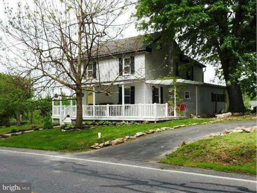 Make this 3 BD, 2 BA Colonial your next home. The front door leads to an open Family Room/Dining area with a wood pellet stove. Kitchen w/island adjoins sunroom and rear deck for additional relaxation.Two car detached garage w/electric, could also be a workshop.Entire lot fenced,with fruit trees,grape vines,raised garden beds. Bring your livestock. Easy access to I-81 & Maryland for commuters.