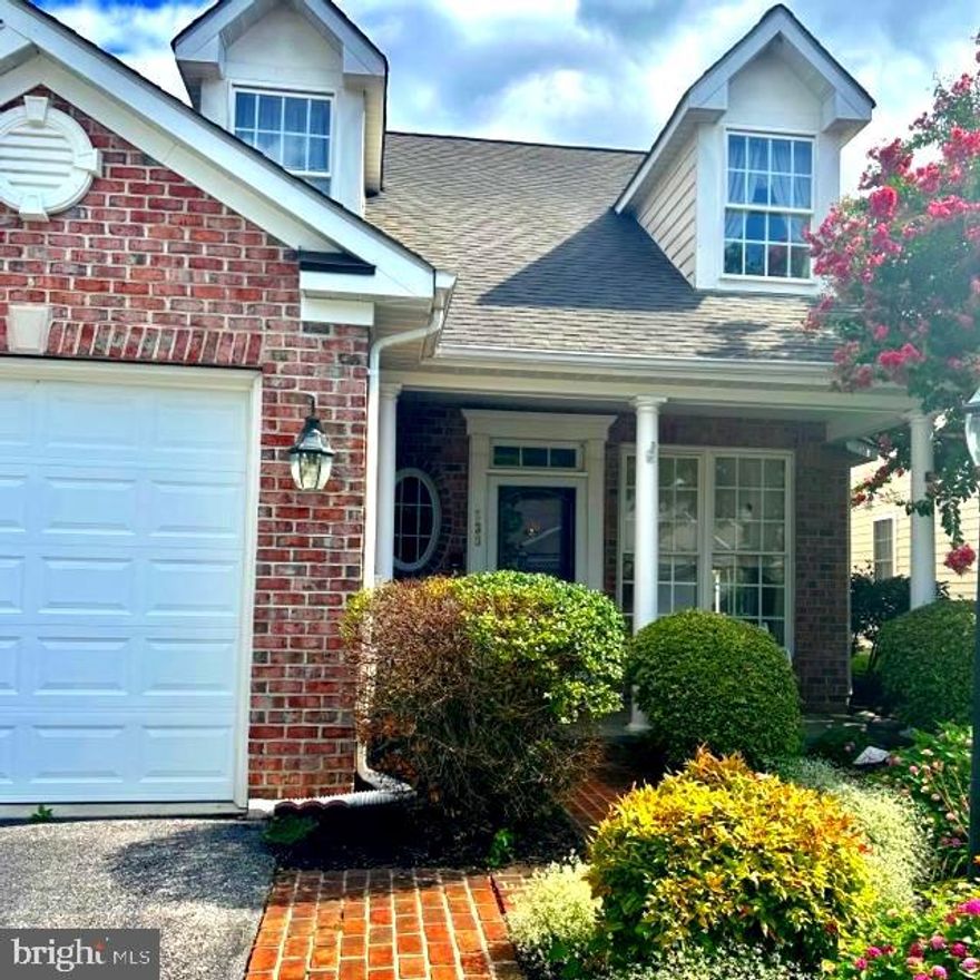 Welcome to this charming brick front cape cod style duplex, nestled in a serene and private 55 and over community with the added advantage of no HOA fees! This adorable home is perfectly located and offers a welcoming front yard that has been meticulously landscaped to eliminate the need for cutting grass in both the front and rear yard, allowing you to simply enjoy the beauty of the surroundings.

Upon arrival, you'll be delighted to find a 1-car garage and a front porch, an ideal spot for savoring your morning coffee and engaging with neighbors. Stepping inside, the interior greets you with an abundance of natural light flooding the front formal living room through many windows.

The foyer area also features a staircase leading to the upper level, which has an opening to the versatile dining/family room combination below, providing a sense of openness and connectivity within the home.

Continuing through the main level, you'll discover the well-appointed kitchen, boasting beautiful light wood cabinets, granite counters, stainless steel appliances, and elegant ceramic tiled floors. Additionally, the convenience of a laundry closet is thoughtfully tucked away in this space, just before the entrance to the garage.

On the same floor, the 1st floor master suite awaits, conveniently positioned adjacent to the kitchen and before the dining/family room area. This generously sized room features a trey ceiling, "his and her" closets, and an en-suite bathroom with a luxurious jetted tub, dual sinks, and a separate shower—a perfect retreat for relaxation.

Throughout the main level, excluding the kitchen and bathrooms, you'll find tasteful wood laminate flooring, adding a touch of warmth and charm to the living spaces.

The cozy dining/family room area is adorned with a cathedral ceiling, and a gas fireplace featuring marble tile, creating an inviting ambiance for gatherings and relaxation. An additional highlight of this lovely home is the custom sunroom situated at the rear, providing a versatile space for a home office, personal sanctuary, or a quiet spot to indulge in your favorite book. The sunroom also grants access to the partially fenced, maintenance-free courtyard-style backyard, where you can enjoy outdoor moments in privacy.

Ascending to the upper level via the wooden steps, you'll find a sizable open room offering endless possibilities. Whether it becomes a delightful TV room, a spacious home office, an exercise area, or a canvas for your creative vision, the choice is yours. Furthermore, the upper level features a second bedroom and a full bath, ensuring ample space for guests or other needs.

Adding an enchanting touch, two dormers grace this level—one in the bedroom and the other in the open area. These dormers include storage benches, providing practicality and a distinctive feature to this already perfect home.

This delightful property is ready to welcome its new owner, offering the opportunity to personalize and infuse their unique touches, making it an even more cherished haven. Don't miss the chance to embrace the comfort and tranquility this home and its welcoming community have to offer!