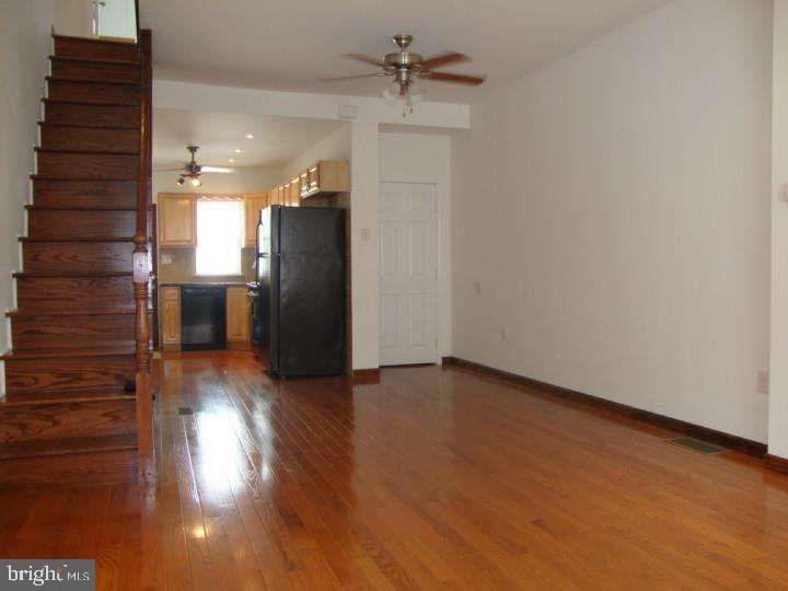 Completely renovated 2 bedrooms and 1 bathroom home for rent in South Philadelphia. This home has an open floor plan with beautiful hardwood flooring throughout. The kitchen is fully equipped with a dishwasher, stove, microwave, refrigerator and granite counter tops. Upstairs you will find two large bedrooms with plenty of closet space for storage. The light filled bathroom is tiled and has a large vanity sink cabinet. You will be cool in the summer with Center Air conditioning. The basement is semi -finished with a washer/dryer. This home in located close to Passyunk Ave, Grocery stores, the stadiums and 3 blocks from the Broad Street subway.