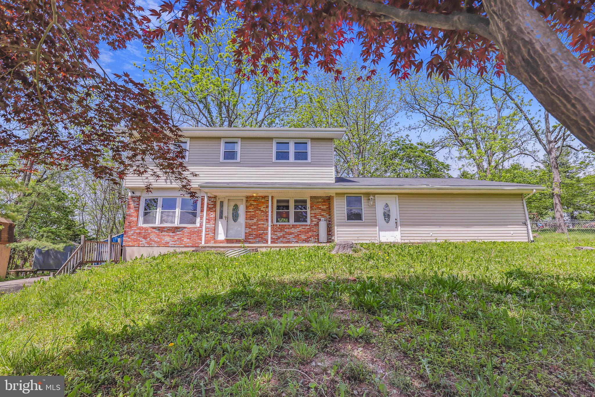 Absolutely huge home. This property sits on almost an acre of land. Lots of potential for your client. Large family room. Mudroom. Multiple outdoor sheds/garages. Basement workshop. Electronic chair lift. Baseboard heat. New windows 2nd floor. Home is sold as-is. Hardwood floors in some of the upstairs bedrooms. Home has a HUGE garage/bay 42x24 feet that can fit up to 4 cars! For those in need of garage space, outdoor work area or storage this home has it all! Also there is a huge concrete pad/basketball court in back yard.