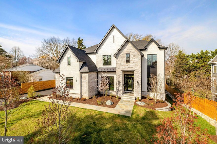 Built in 2025 and thoughtfully enhanced with over $150,000 in capital improvements, 1100 Balls Hill Road presents a rare opportunity to own a better than new, former model home in the prestigious Langley neighborhood of McLean. Offering over 8,200 square feet of refined living space across three finished levels, this exceptional 7-bedroom residence combines timeless design with modern luxury in one of Northern Virginia’s most sought-after locations.
Ideally situated inside the Beltway and within the Cooper Middle School and Langley High School pyramid, this home offers both convenience and long-term value. Its prime McLean setting provides easy access to major commuter routes, top-tier healthcare, public transportation, and an abundance of shopping and dining options, all contributing to a vibrant and connected lifestyle.
Constructed with meticulous attention to detail, the home features a spacious and open floor plan designed for both everyday living and elegant entertaining. The chef’s kitchen is the centerpiece of the home, appointed with premium Wolf and Sub-Zero appliances, quartz countertops, and classic Shaker-style maple cabinetry. A fully equipped Spice Kitchen allows for seamless, out-of-sight meal preparation.
The main living areas flow effortlessly to outdoor spaces featuring no-maintenance decking, while the fully finished walkout lower level offers an impressive extension of living and entertaining space, complete with a media room, wet bar, expansive recreation area, and luxury flooring throughout.
Upstairs, the luxurious primary suite serves as a private retreat, featuring dual walk-in closets, a freestanding soaking tub, separate vanities, and a convenient wet bar. Each additional bedroom is generously sized and includes its own walk-in closet, ensuring comfort and functionality for family and guests alike.
Additional highlights include a 3-car garage with an EV charging plug, and the home has been designed with future elevator installation in mind. The recent capital improvements further enhance the home’s value, offering a move-in ready experience with thoughtful upgrades already in place.
This 2025-built residence represents a unique blend of modern construction, premium upgrades, and an exceptional McLean location—an outstanding opportunity for those seeking both luxury and long-term investment value.