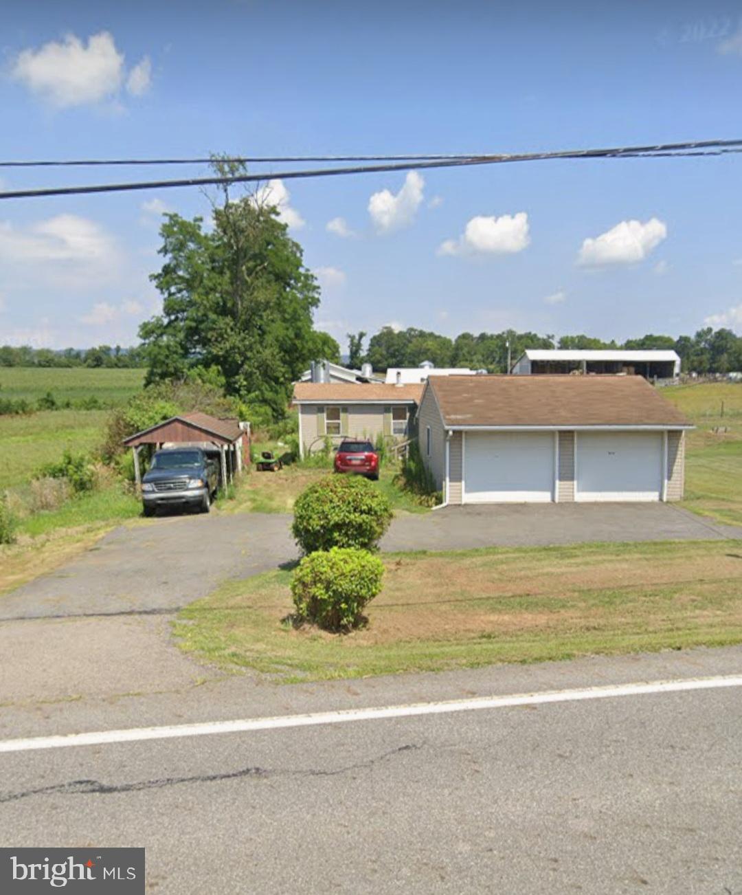 Welcome to 2351 Route 209, a charming 3-bedroom, 1-bath double-wide nestled on 0.24 acres in a peaceful, rural setting. This property offers inexpensive living with the added bonus of a detached 2-car garage — perfect for vehicles, storage, or a workshop. Enjoy the quiet of the countryside while remaining close to town conveniences. Whether you're looking for a primary residence, an affordable investment, or a weekend getaway, this property offers a great opportunity to make it your own.