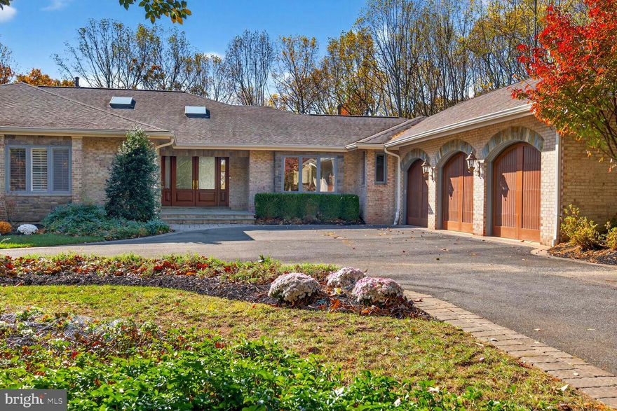 Filled with natural light and tall ceilings throughout, this home feels like a private retreat designed for connection and comfort. Sunlight pours through tall windows, gliding across gleaming hardwood floors and high ceilings that create a sense of calm and openness. The spacious kitchen—with stone counters, high-end stainless steel appliances, recessed lighting, and a sunny kitchen dining area—flows seamlessly into the dining and living rooms, where a fireplace sets the scene for cozy evenings or lively gatherings. This versatile home is well-suited for all generations, with 5,100 SF on the main level and 3,300 SF finished above-grade SF on the lower level.

Step outside to the rear deck and watch the sunrise with your morning coffee or unwind with sunset cocktails overlooking the pool-ready backyard—perfect for entertaining and relaxing. The main level features a serene primary suite and three additional bedrooms, ideal for family or guests. With two fireplaces, a three-car oversized main-level garage, and timeless flagstone steps leading to the front door, every detail blends warmth and sophistication. A home where every day begins and ends with beauty.

📍Close to:
Potomac Village 🛍️ (grocery, cafés, restaurants including Duke’s)
Great Falls National Park 🌲
Old Anglers Inn 🍽️
Wild Tomato 🍕
Avanel Golf Course ⛳ & Congressional Country Club 🏌️‍♂️
I-495 Beltway 🚗, River Road & MacArthur Blvd into DC 🌆

✨Recent Upgrades:
💧 Flo-Logic automatic water shut-off system (2024)
💡 New lighting (2025)
🪵 Rear deck upgrades (2025)

🏡 Special Features:
🔌 Back-up generator
🛁 Jacuzzi
🥶 Two Sub-Zero refrigerators
🚙 Oversized 3-car garage
🍽️ Double dishwashers
🧺 Double laundry machines
🧹 Central vacuum
🥫 Large walk-in food pantry & custom kitchen closets
👨‍👩‍👧‍👦 Versatile home, well-suited for all generations