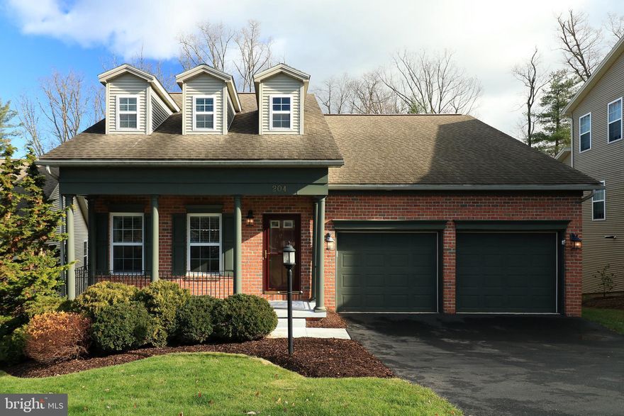 Discover this elegant home, perfectly situated with a private backyard that extends into the woods and borders the community’s green space. Featuring an impressive 18-foot foyer, hardwood floors, a double-sided natural gas fireplace, and sunroom. The kitchen shines with cherry cabinets, stainless steel appliances, and granite countertops, flowing into a sunny breakfast area. The first-floor primary suite offers a spacious en suite bath, with main-level laundry for effortless living. Upstairs, three generous bedrooms and a full bath provide ample space, while the walkout lower level is ideal for entertaining with a family room, wet bar, full bath, and additional living area. Outside, a brand-new composite deck invites relaxation and gatherings, while the two-car garage and community amenities—including a fitness room, entertainment area, and outdoor pool—add to the appeal. Conveniently located near Beaver Stadium, shopping, dining, and campus, this home offers the best in comfort and location.  Taxes are in the appeal process.